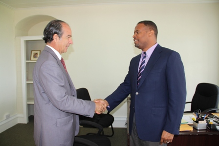 Leader of the Opposition in the Federal Parliament Hon. Mark Brantley (l), who is also the Deputy Premier of Nevis and Minister of Tourism in the Nevis Island Administration, meets with Ambassador from the Republic of Chile to St. Kitts and Nevis His Excellency Eduardo Bonilla Menchaca at his Bath Hotel office